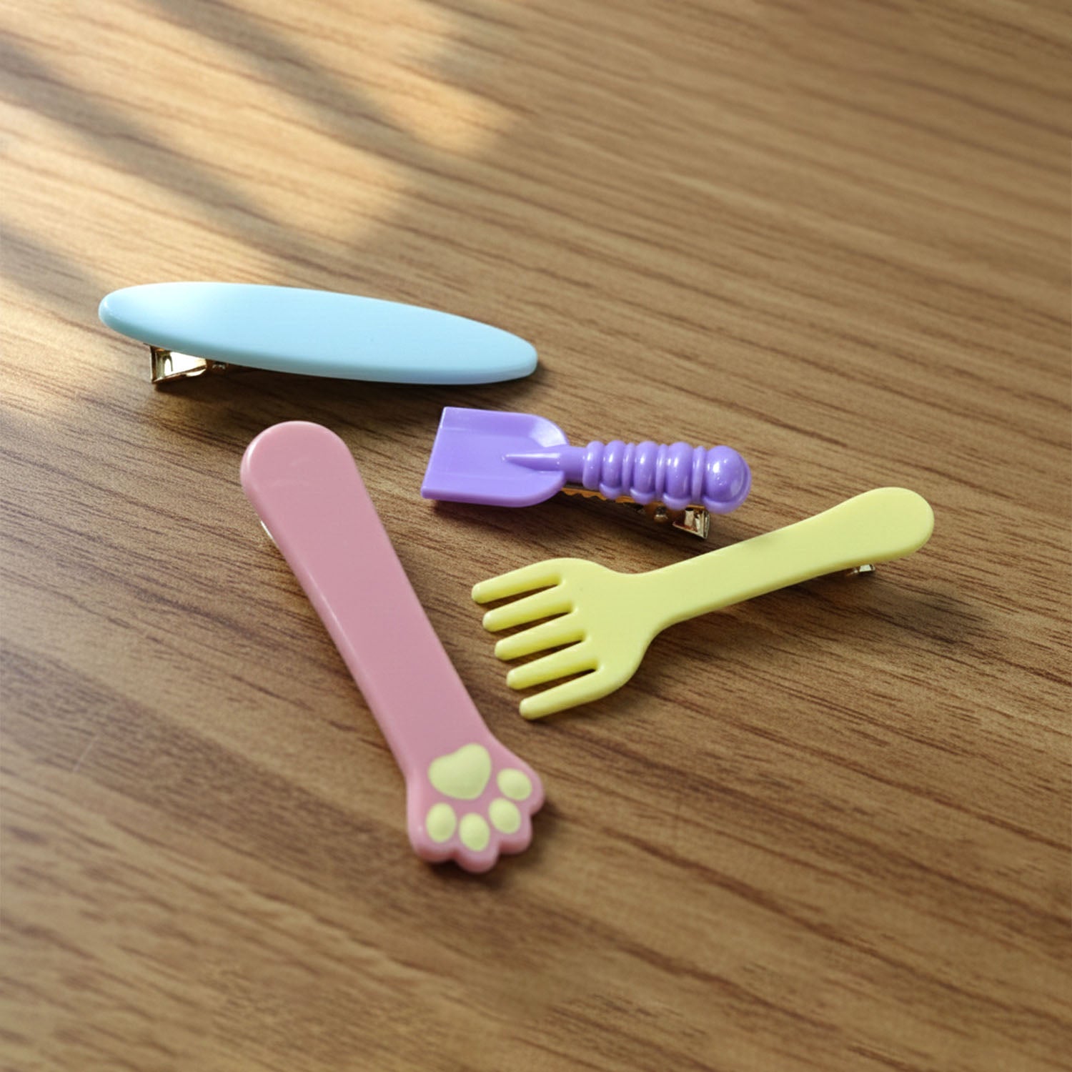 Set of four Wukusy cute multi-design hair clips featuring colorful and playful styles for everyday hair accessories.