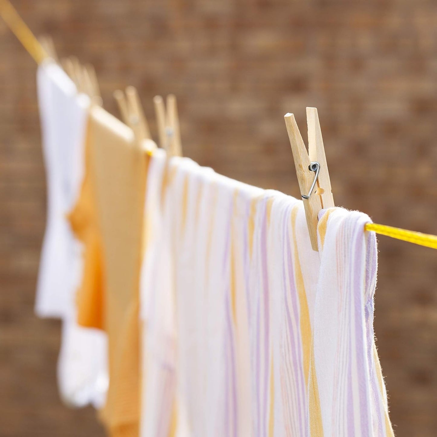 Set of 10 heavy-duty bamboo wooden cloth clips or pegs from Wukusy, ideal for home improvement laundry and hanging tasks.