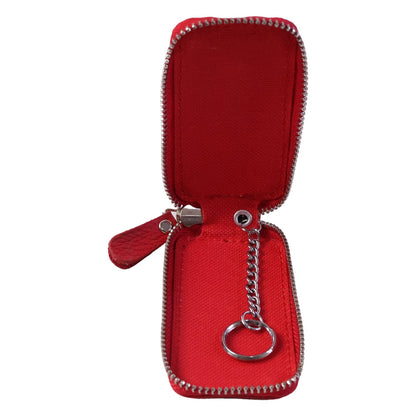 Leather car key case by Wukusy with zip closure and snap hook, designed to securely hold smart car keys.