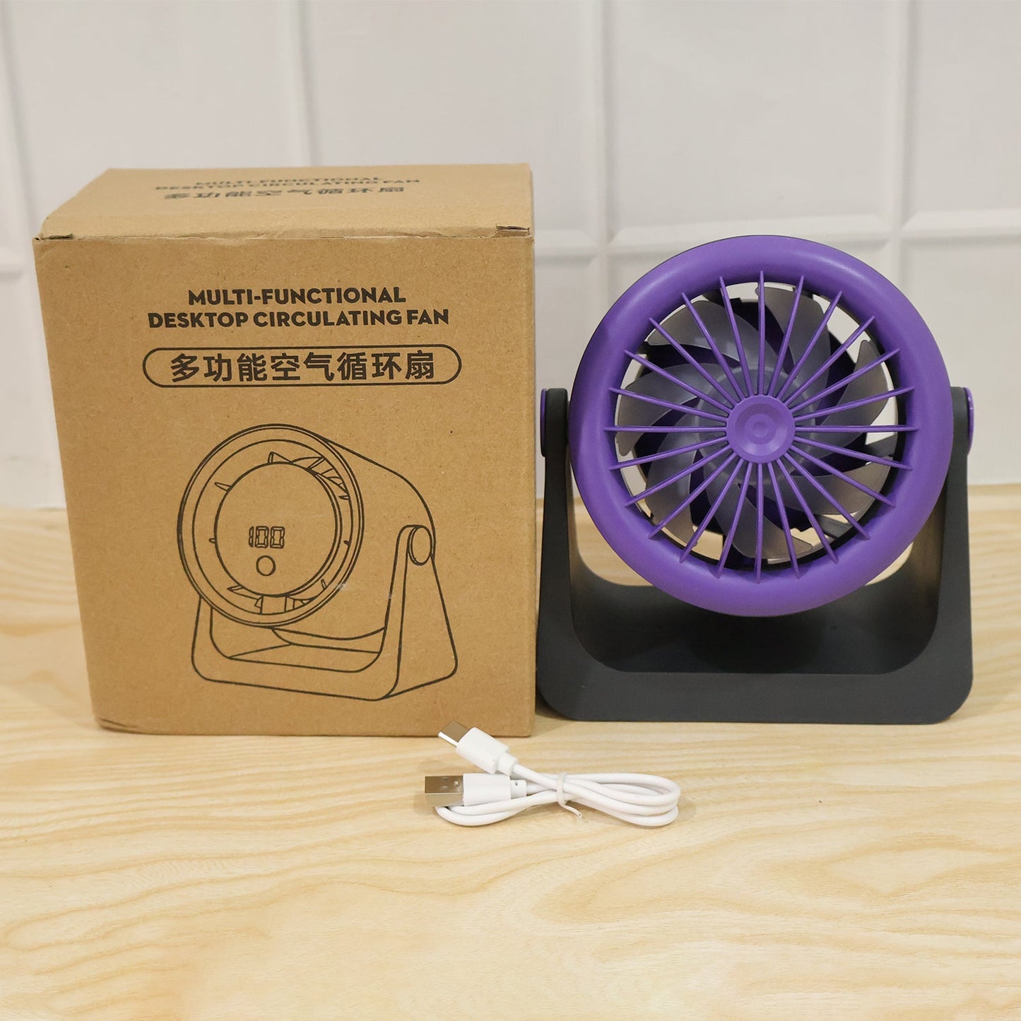 Wukusy personal desktop air circulation fan, portable USB desk fan showing compact design and adjustable tilt for cooling.