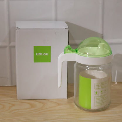 Wukusy glass oil bottle with lid, 580ml capacity, for storing and pouring cooking oils in a kitchen setting