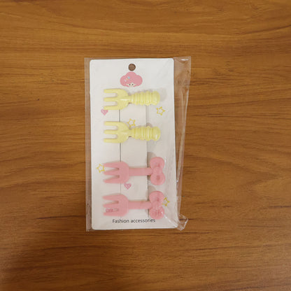 Set of four cute mini fork-shaped hair clips by Wukusy for girls and women, perfect for stylish hair accessories.