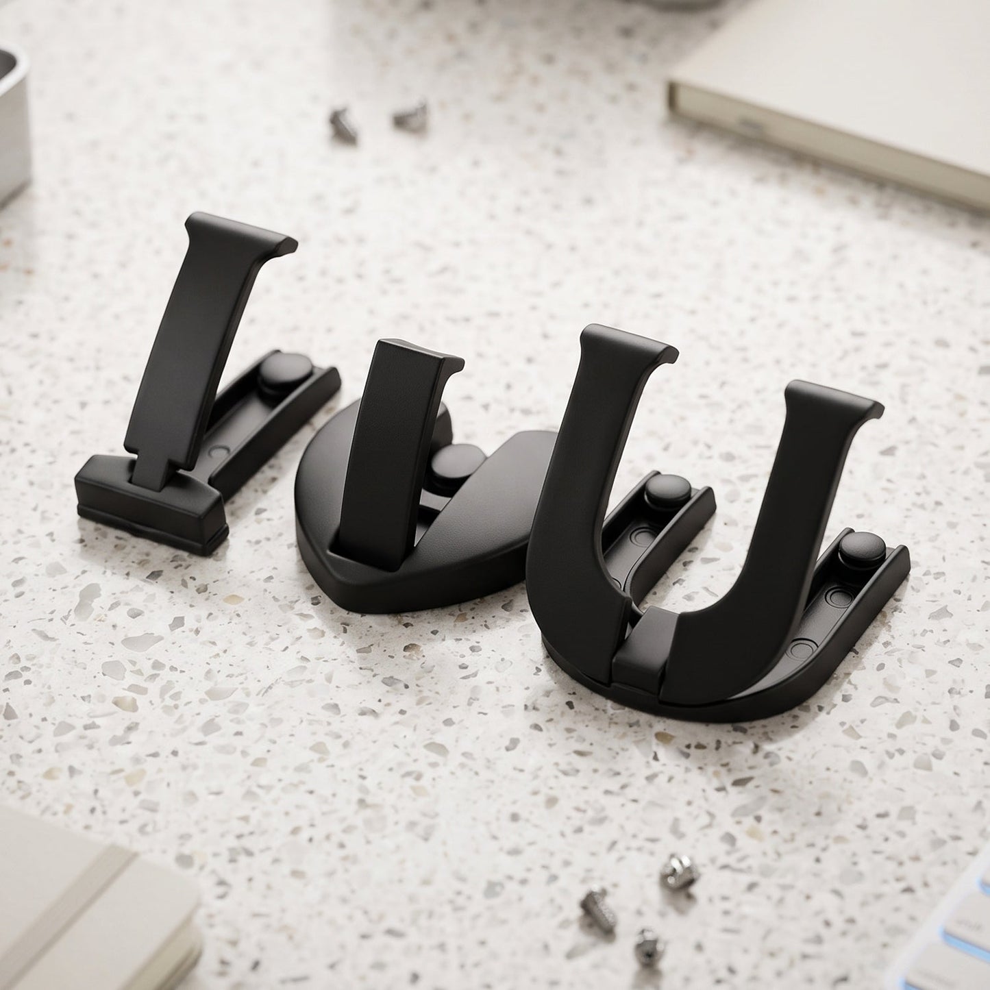 Wukusy premium heavy duty wall hook set with 3 self-adhesive hooks for clothes and bags, mounted on a wall surface.