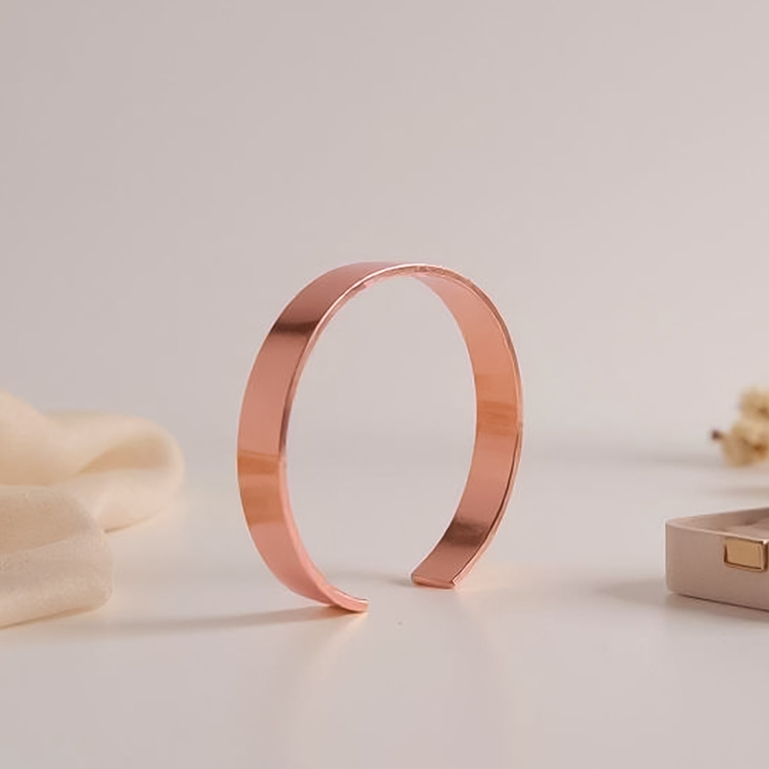 Elegant rose gold-plated open cuff bracelet by Wukusy featuring a sleek, minimalist design for fashion accessories.