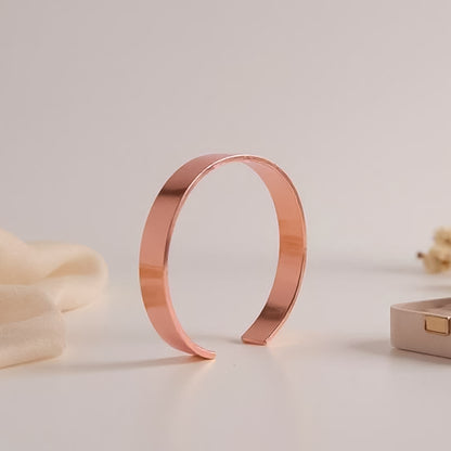 Elegant rose gold-plated open cuff bracelet by Wukusy featuring a sleek, minimalist design for fashion accessories.