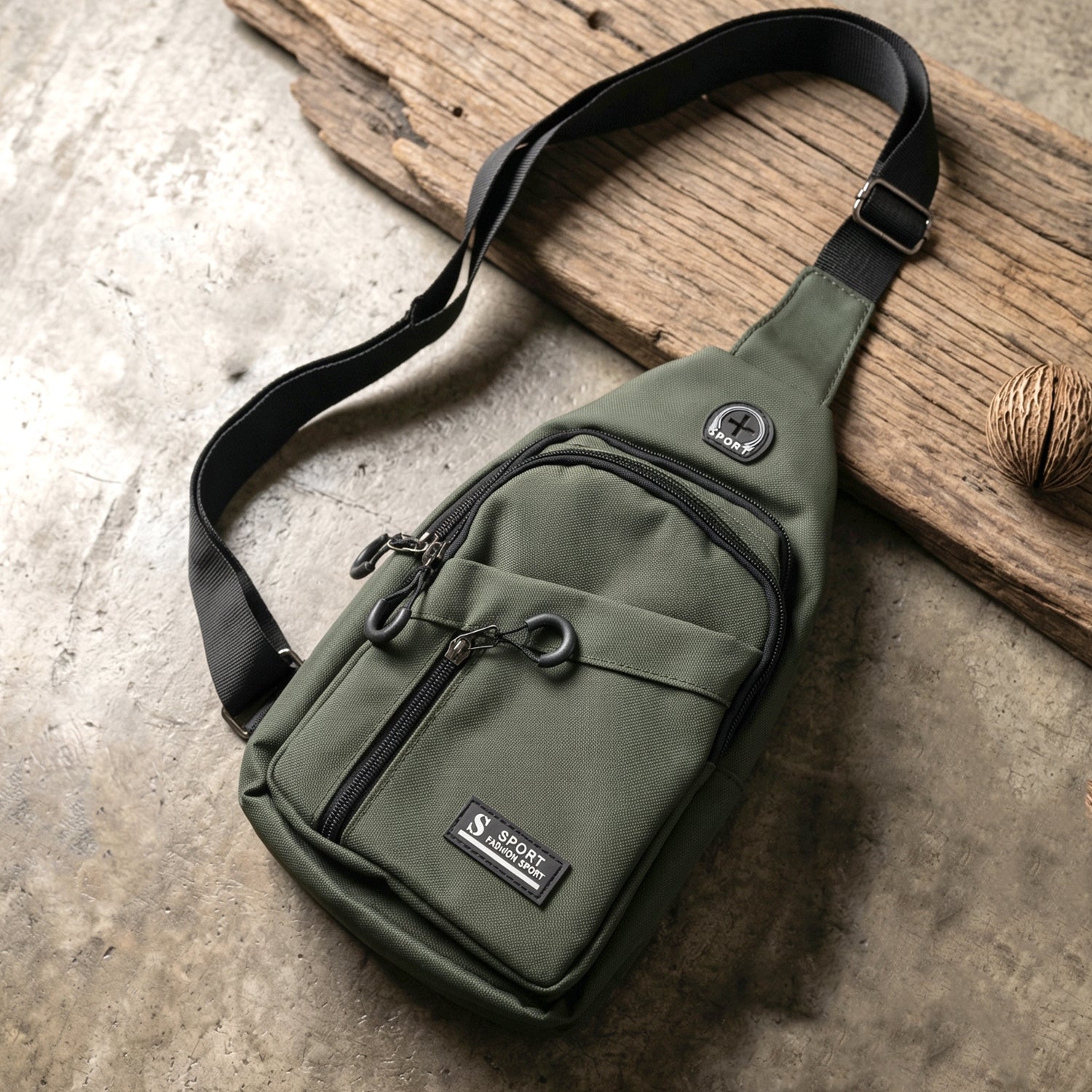Wukusy durable waist bag with zipper, crossbody sling style, featuring multiple compartments and adjustable strap.