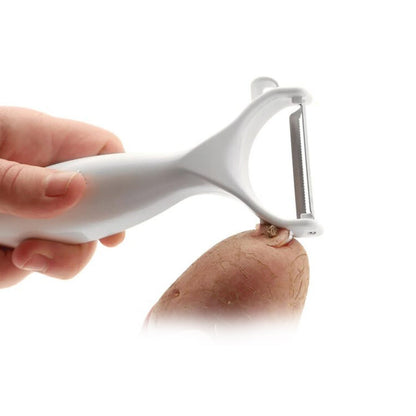 Wukusy vegetable and fruit peeler for kitchen use with ergonomic handle and sharp blade for efficient peeling.