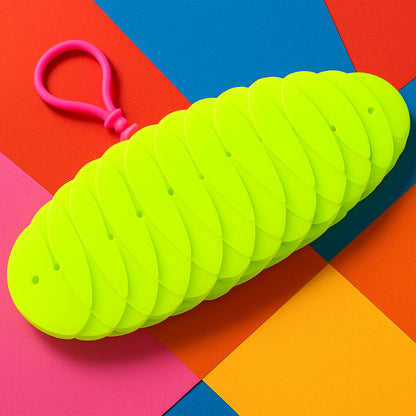 Flexible plastic worm fidget toy by Wukusy, shown in green with multiple segments, designed for stress relief and sensory play.