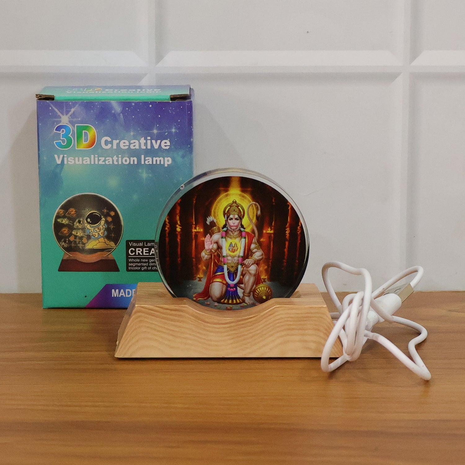 3D acrylic LED night lamp featuring Hanuman Ji design by Wukusy, illuminated with vibrant colors and intricate details.