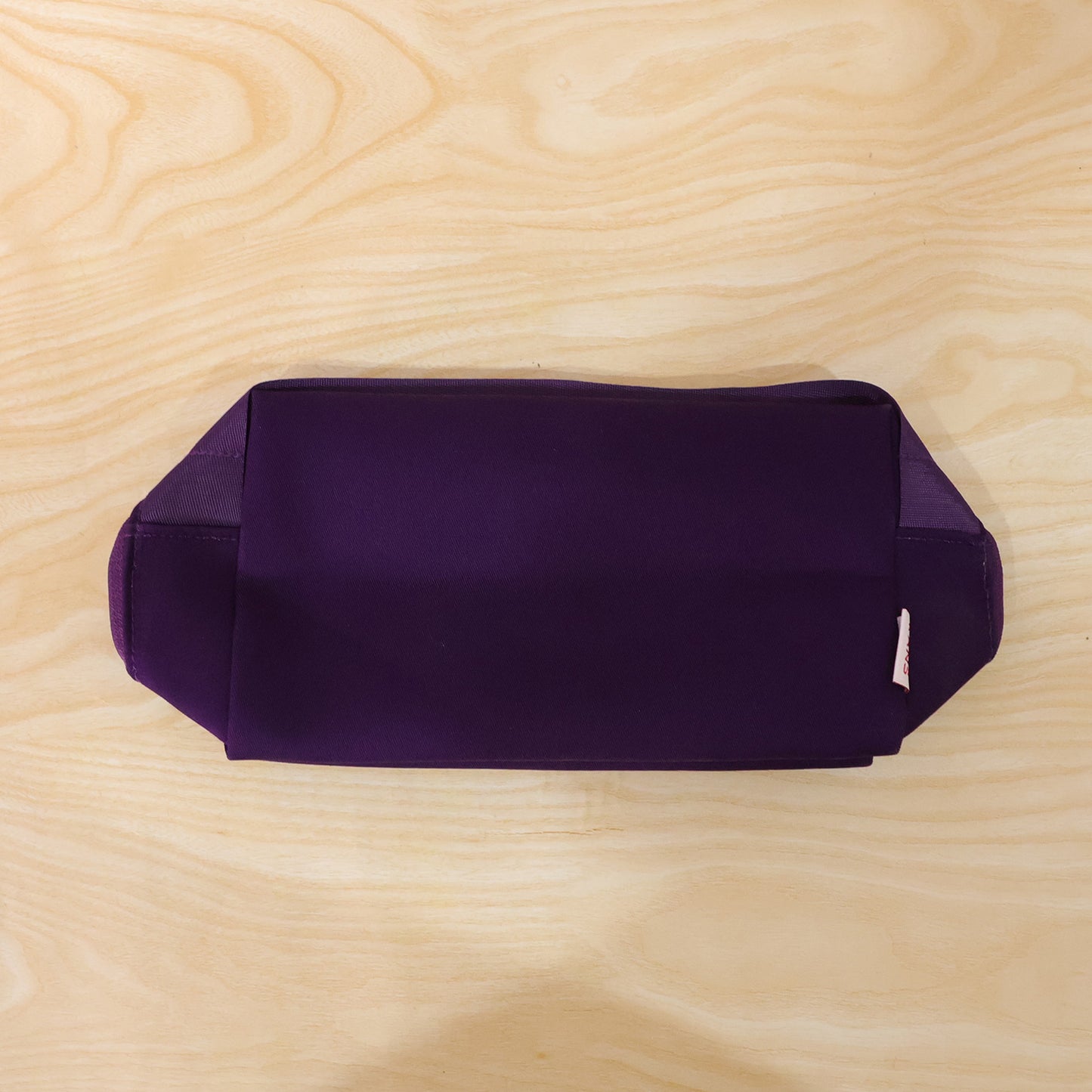 Wukusy multipurpose travel makeup organizer storage bag with multiple compartments for cosmetics and toiletries.
