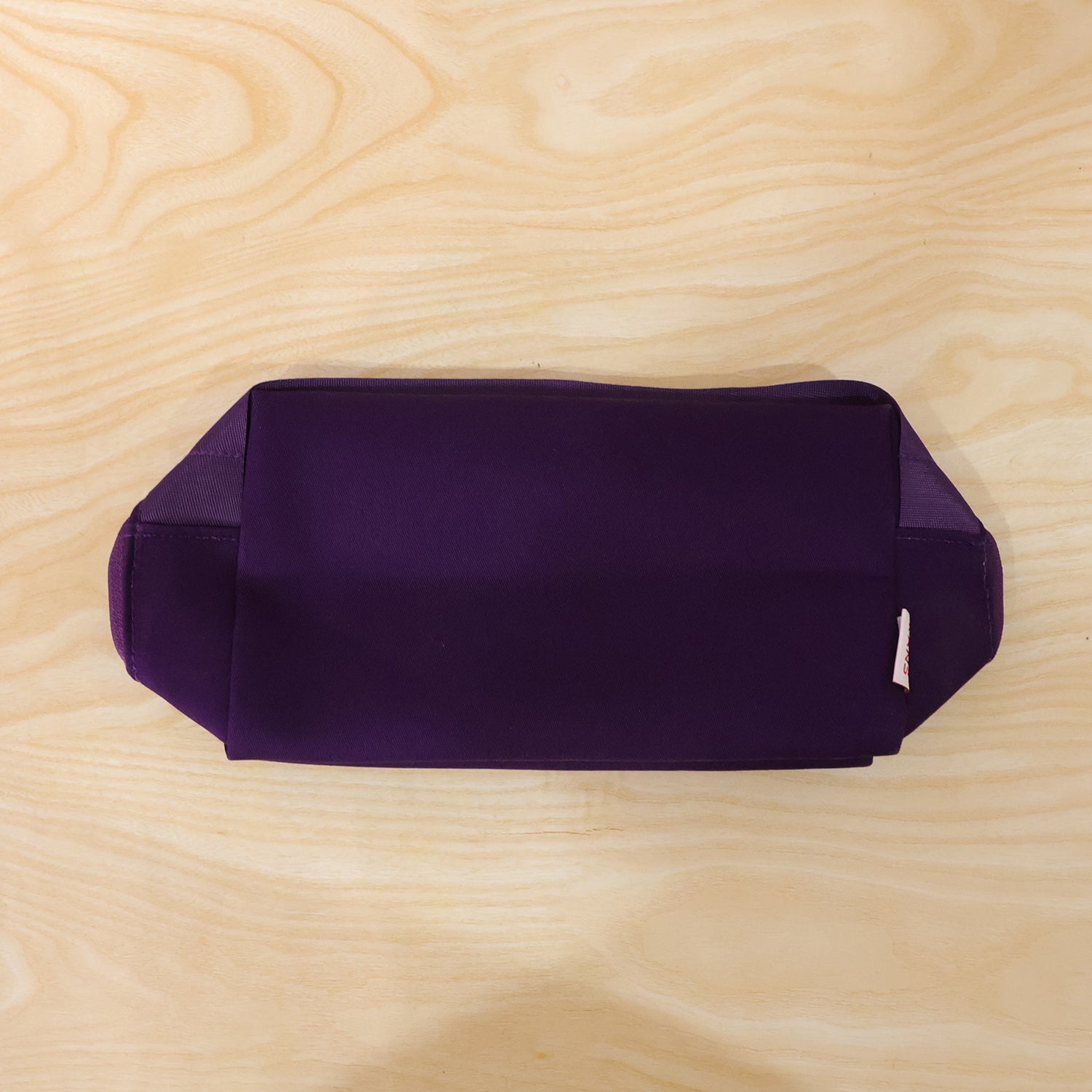 Wukusy multipurpose travel makeup organizer storage bag with multiple compartments for cosmetics and toiletries.