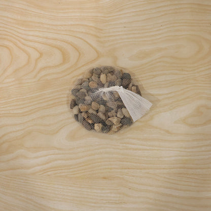 Set of decorative natural pebble stones by Wukusy, perfect for aquarium, vase, garden, and home decor arrangements.