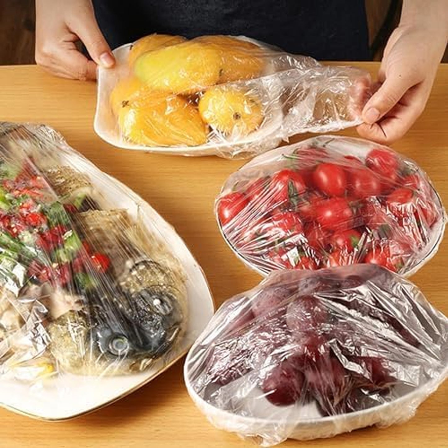 Set of 100 small disposable elastic food storage covers by Wukusy, flexible plastic bags for keeping food fresh.