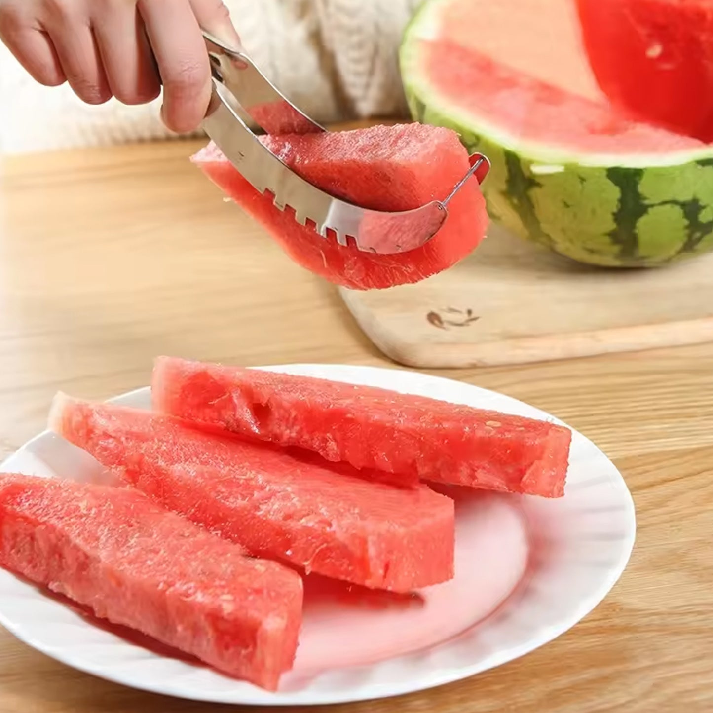 Wukusy 3-in-1 stainless steel watermelon and cantaloupe slicer, corer, and knife for efficient fruit and vegetable preparation.