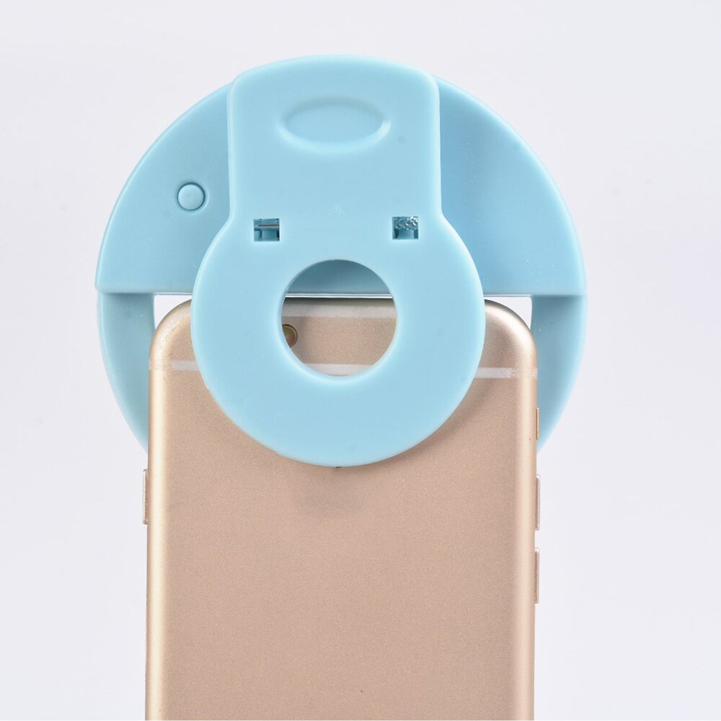 Wukusy 4785 Selfie Ring Light showing bright illumination on face for selfies and videos, portable and adjustable for perfect lighting.