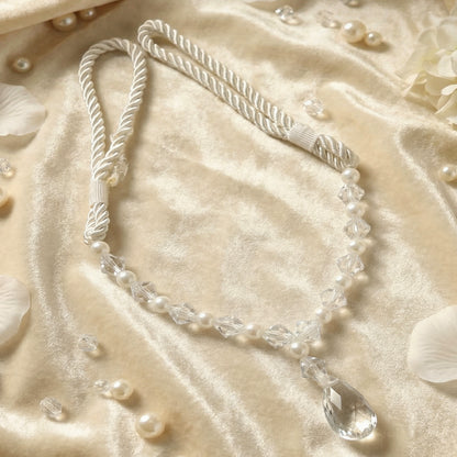 Luxury crystal and pearl beaded curtain tieback by Wukusy, featuring elegant crystal and pearl beads for decorative window holding.
