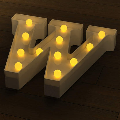 Wukusy W Shaped LED decorative night light, home decor item, glowing night light with modern design, illuminated in the image.