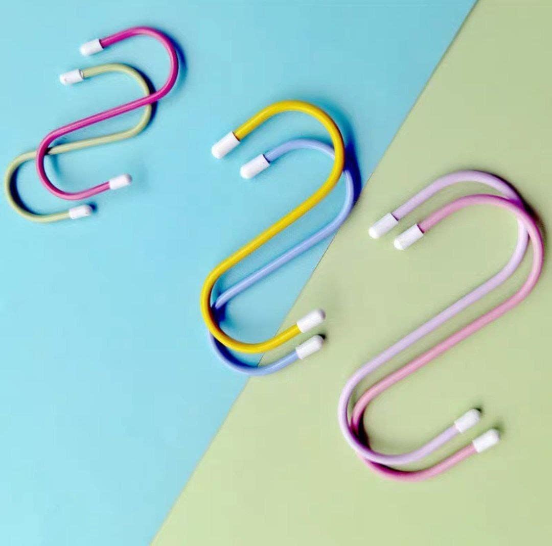 Set of six Wukusy S-shaped metal hooks for hanging clothes, tools, or accessories in kitchen, wardrobe, or workshop settings.