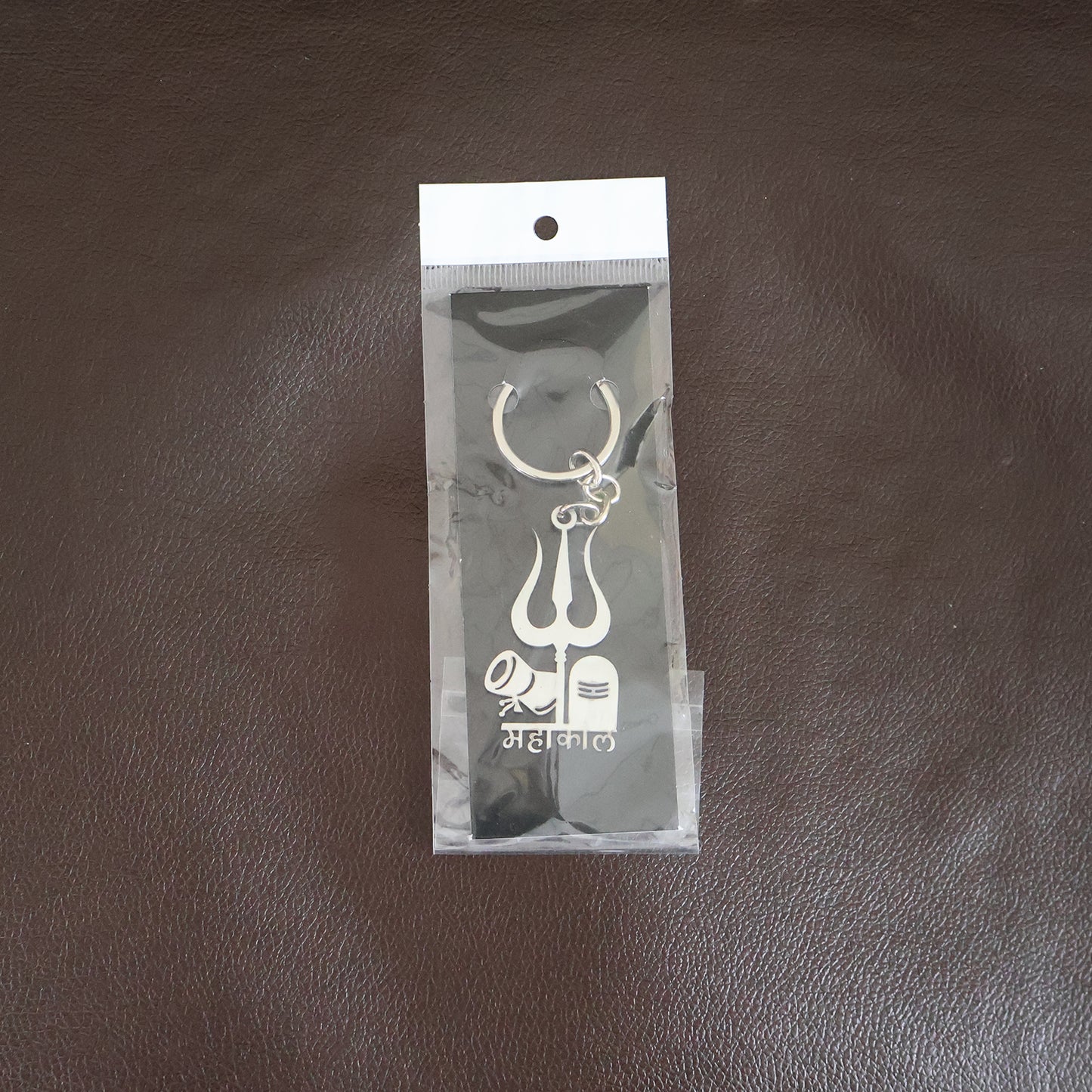 Wukusy Mahakal Trishul Shivling design metal keychain, featuring intricate Hindu spiritual symbols and craftsmanship.