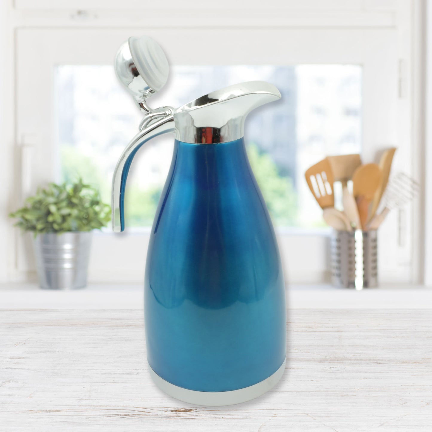 Wukusy stainless steel vacuum insulated kettle jug, 2L, for hot beverages like tea and coffee, suitable for home, office, or travel.