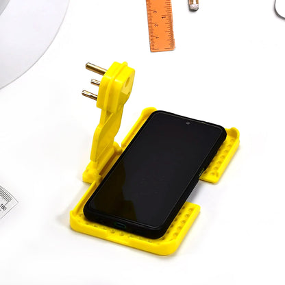 Wukusy multi-purpose wall holder stand for mobile charging, in mix colors, fits in socket and hangs smartphones or accessories.