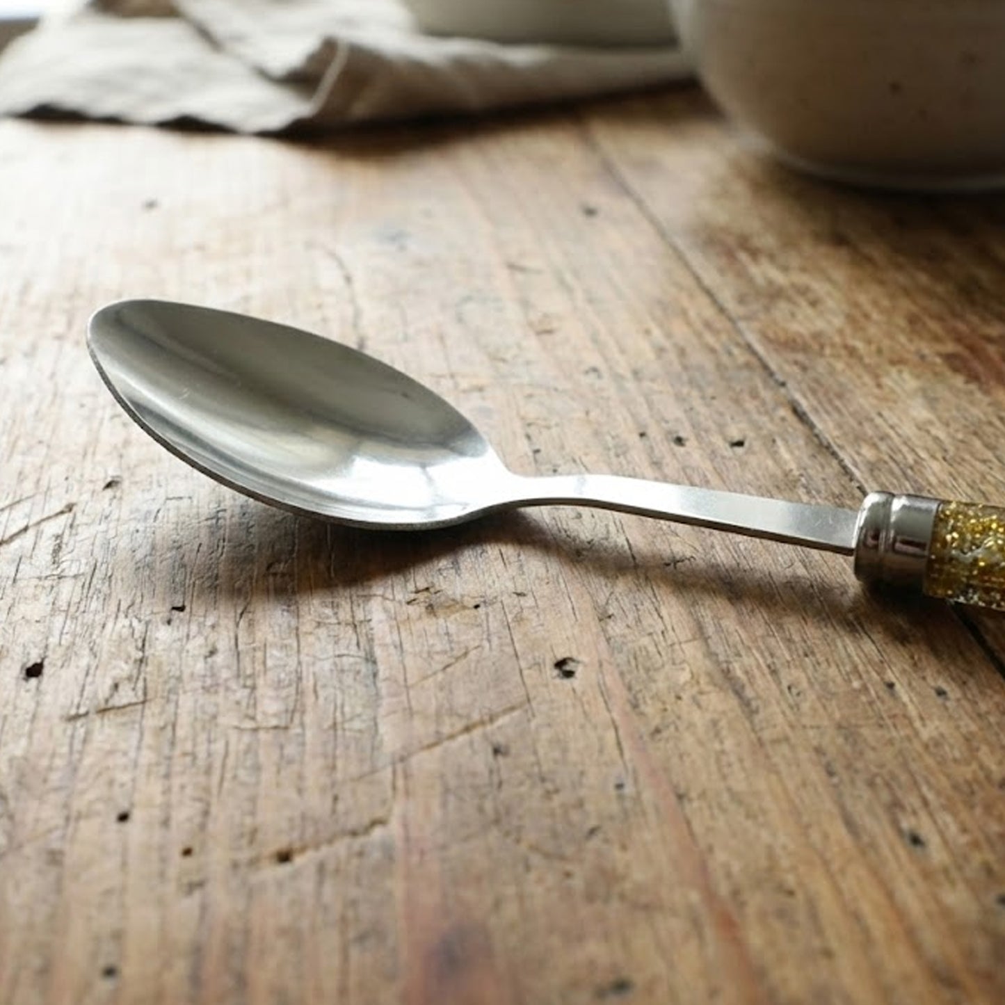 Wukusy premium stainless steel dining spoon set with two spoons, shiny polished finish, ideal for everyday dining and serving.