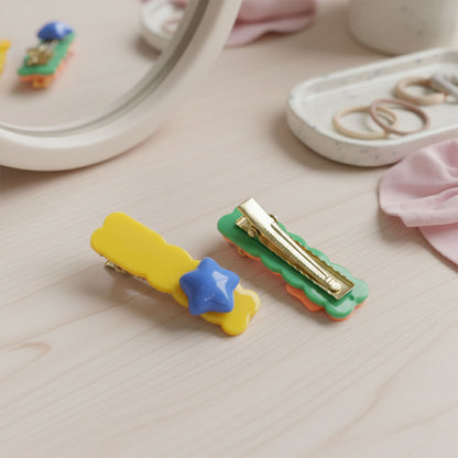 Set of four colorful star design decorative hair clips by Wukusy, perfect for adding a playful touch to hairstyles.