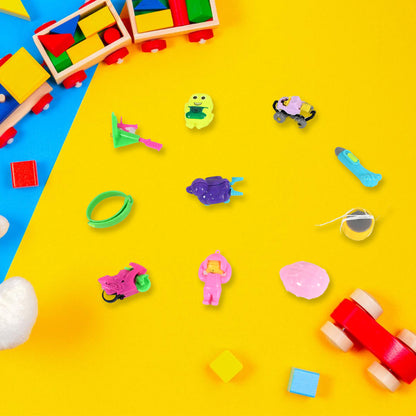 Wukusy 10-in-1 kids' toy set with ten small colorful toys for children to explore and play with.