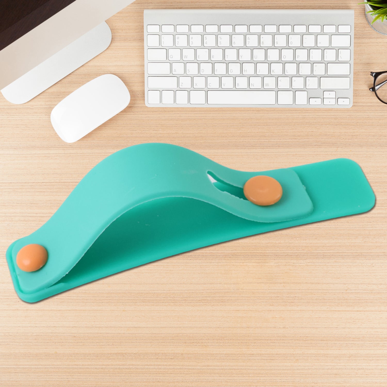Teal green silicone phone loop finger holder strap by Wukusy, designed for secure grip and easy handling of smartphones.