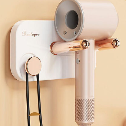 Wukusy wall mount hair dryer holder with self-adhesive backing, designed for convenient home bathroom organization.