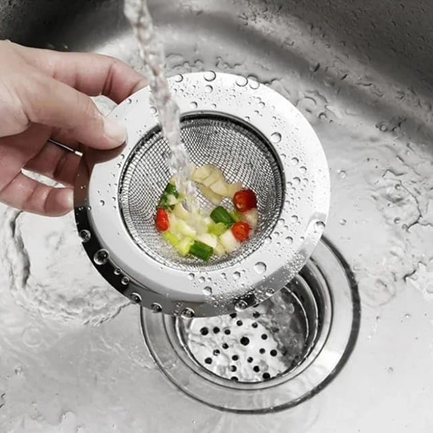 Small stainless steel kitchen sink drain strainer stopper, 7 cm, from Wukusy, designed to prevent clogs and catch debris.