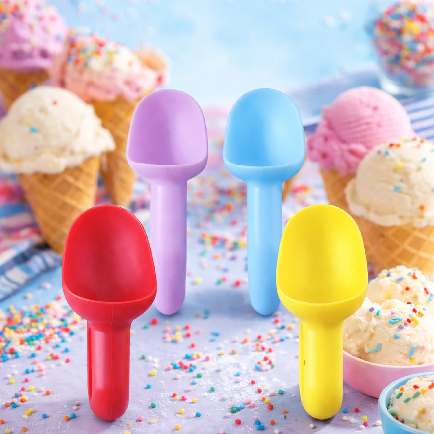 Wukusy 4-piece plastic ice cream scoop set with colorful handles, perfect for serving ice cream and frozen desserts.