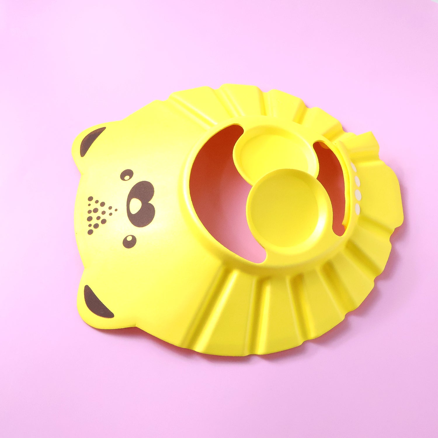 Cute cartoon baby shower cap by Wukusy, featuring colorful design, waterproof bath hat for gentle shampooing and bath time.