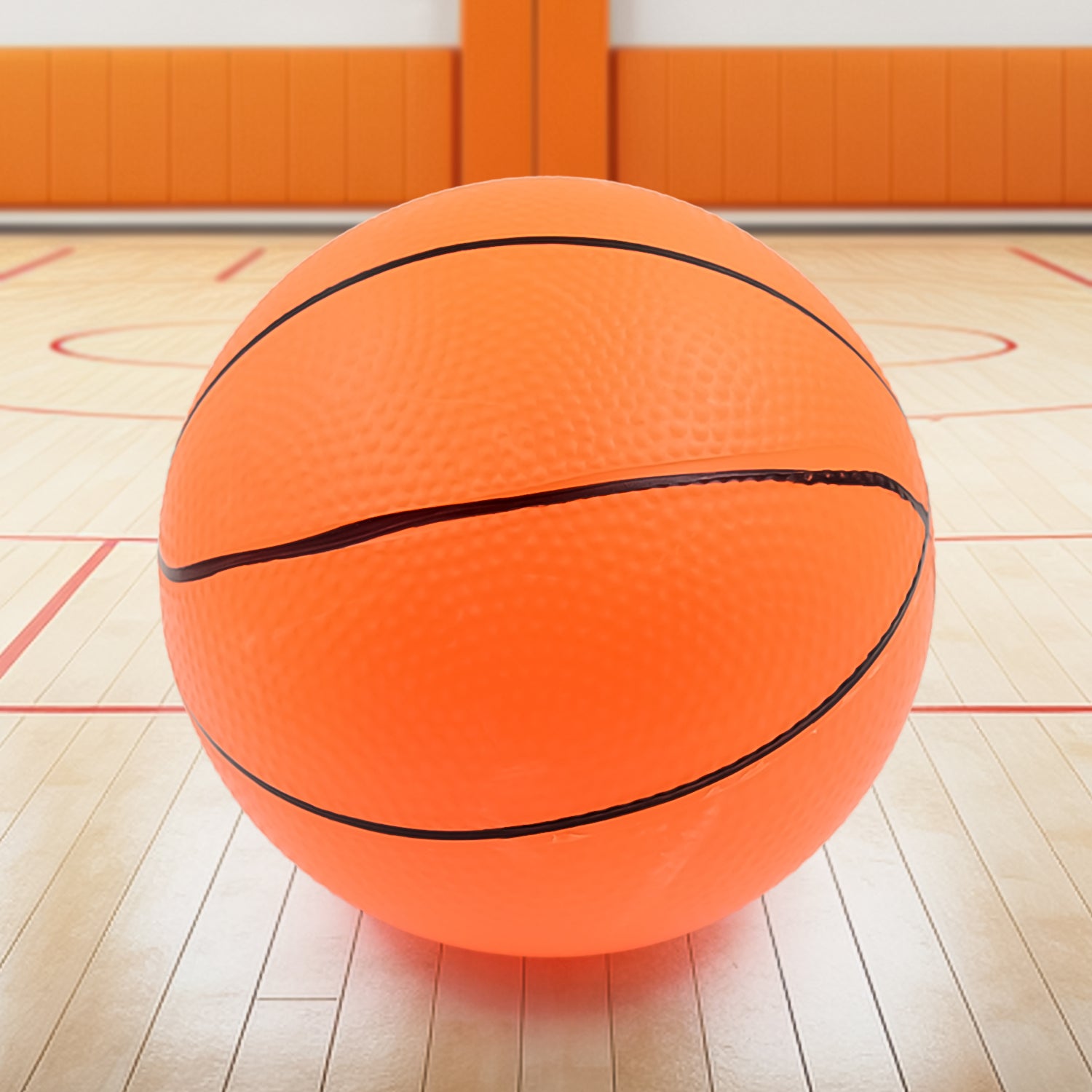 Wukusy Mini Bouncy Basketball for sports, small rubber ball designed for indoor and outdoor play, vibrant orange color with black detailing.