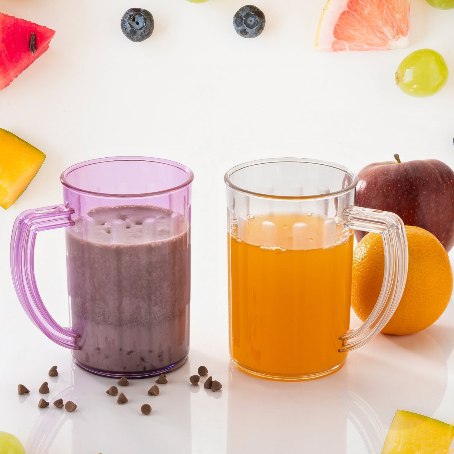 Two clear Wukusy unbreakable juice and beer glasses with handles, suitable for kids, on a kitchen countertop.