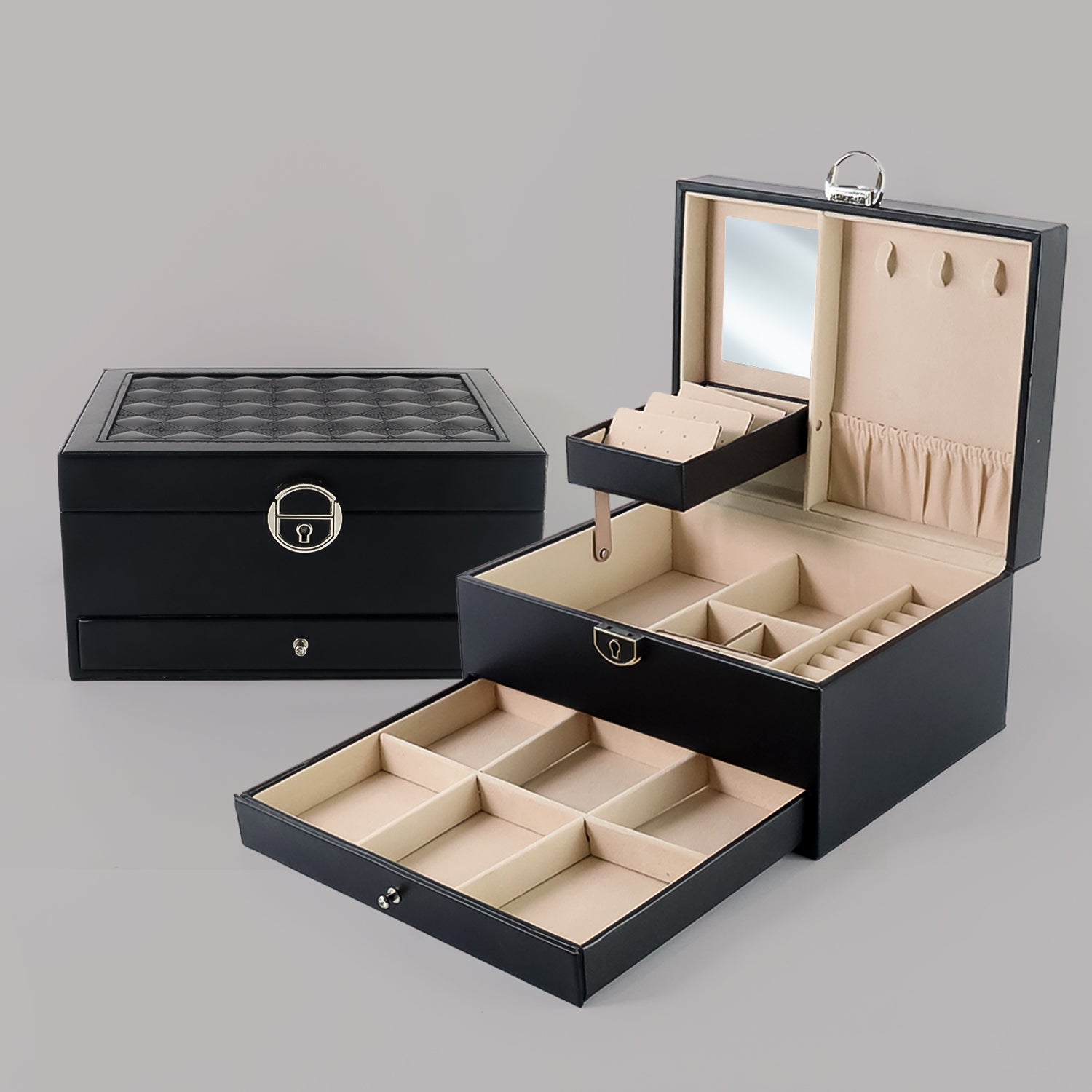 Wukusy multi-layer jewelry organizer box with compartments for necklaces, rings, and earrings, shown open with jewelry inside.