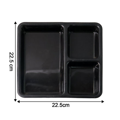 Black plastic multi-compartment meal serving tray with three sections, ideal for dining or meal presentation.