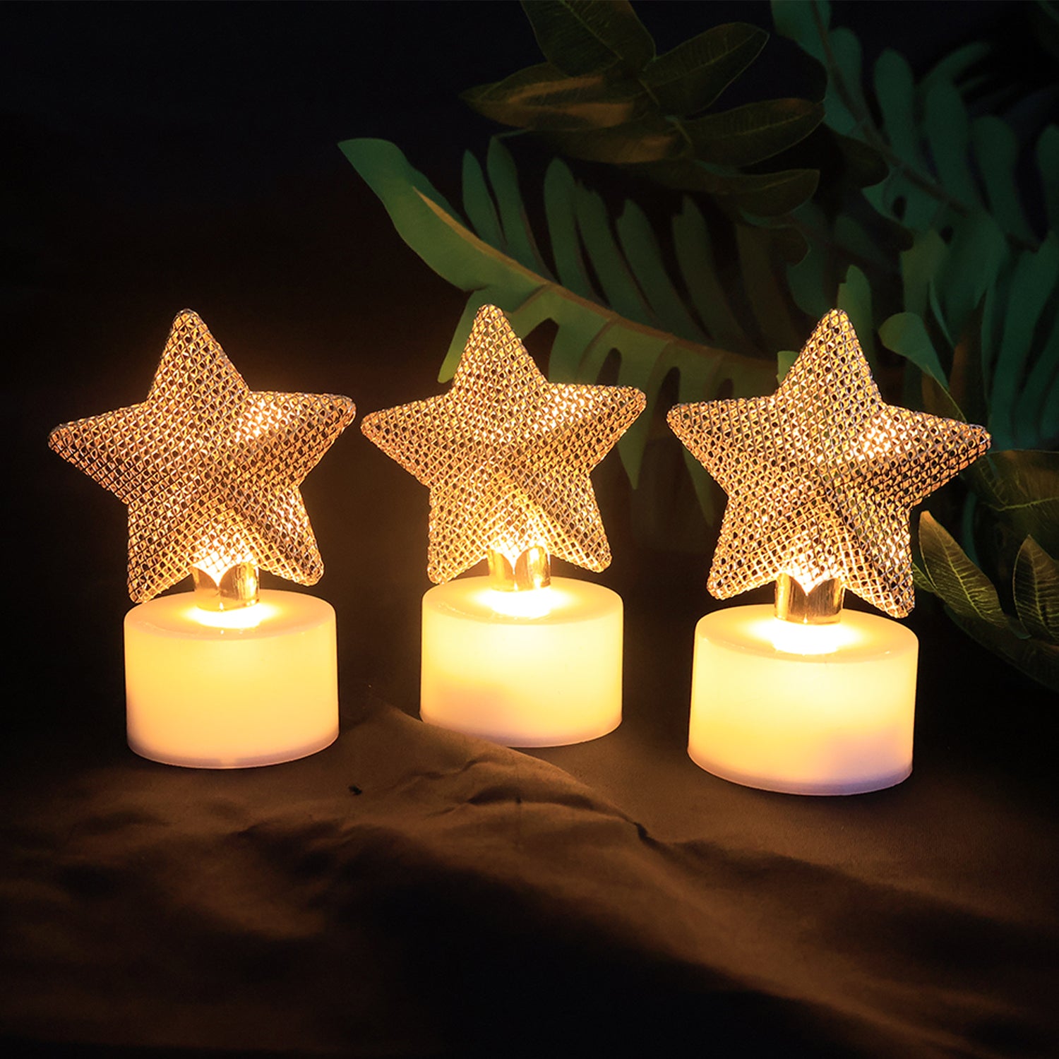 Set of 12 decorative LED star candles by Wukusy, featuring glowing star-shaped candles for home decor.