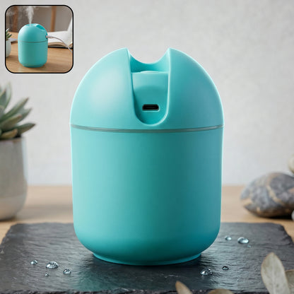 Wukusy portable USB mini air humidifier with cool mist, compact device shown with mist emission and water tank visible.