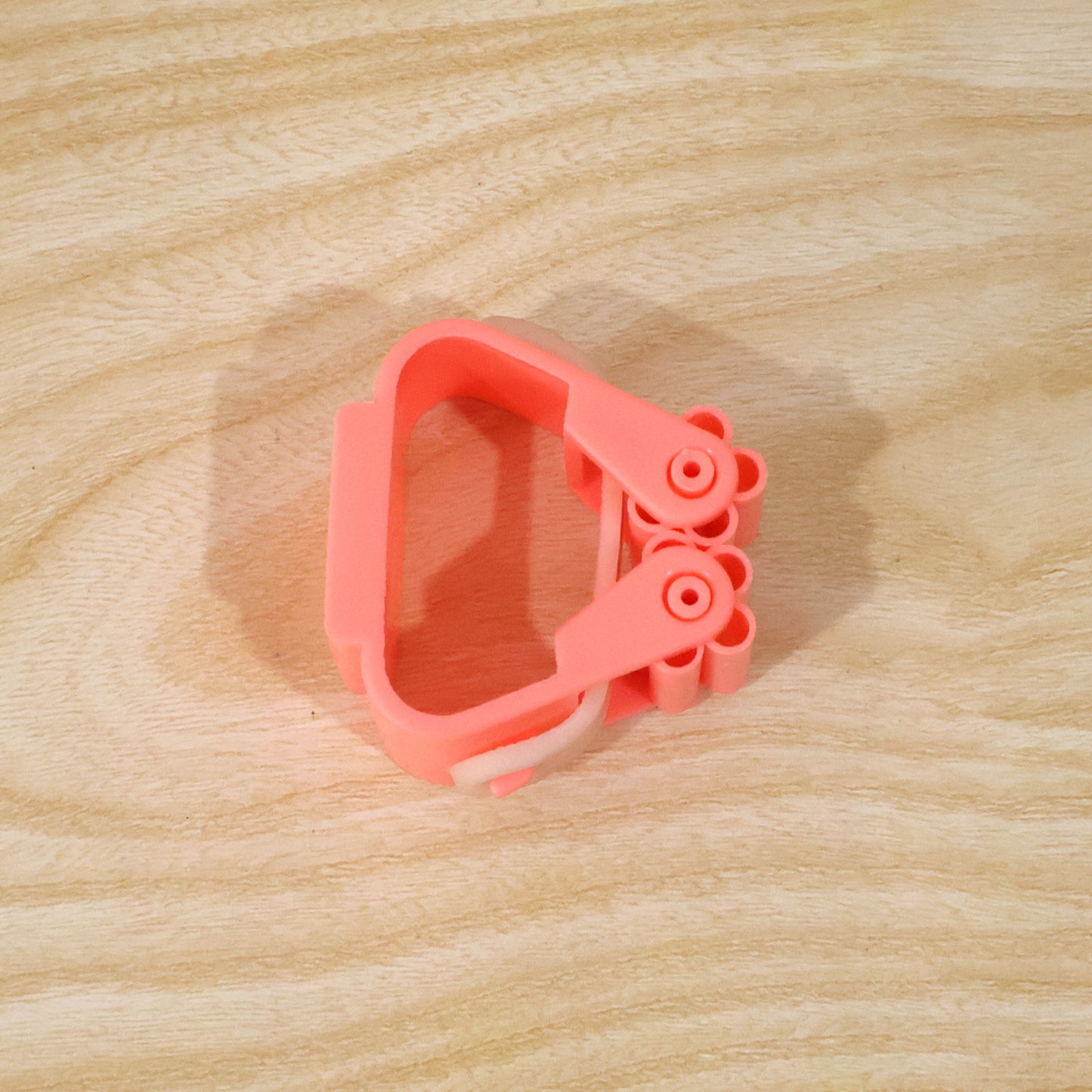 Wall-mounted Wukusy plastic broom holder clip for organizing mops and brooms in laundry or utility rooms.