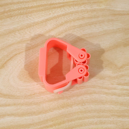 Wall-mounted Wukusy plastic broom holder clip for organizing mops and brooms in laundry or utility rooms.