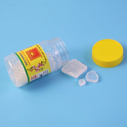 Premium Wukusy Bhimseni Camphor flakes in a 20g package, showing clear, white camphor crystals in a transparent container.