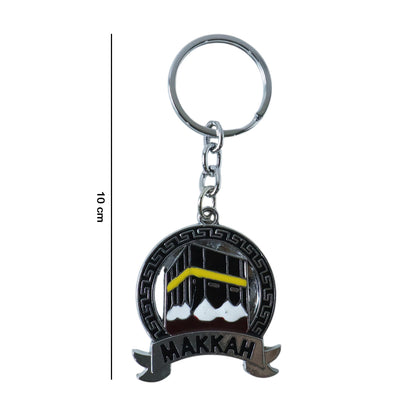 Wukusy premium Makkah design metal keychain with round pendant, featuring intricate Islamic artwork, on a keyring.