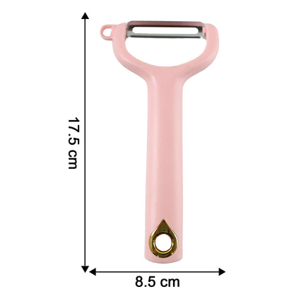 Wukusy handheld vegetable and fruit peeler with ergonomic handle and stainless steel blade for easy peeling.