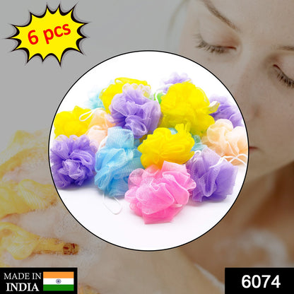 Six Wukusy bath shower loofah sponges, soft pouf body scrubbers for cleansing and exfoliating skin in the health and beauty routine.