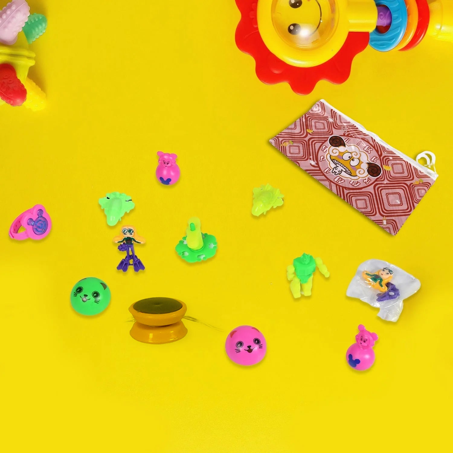 Wukusy 12-piece toy and plastic pouch set for kids, featuring colorful playing toys and various plastic items for children.