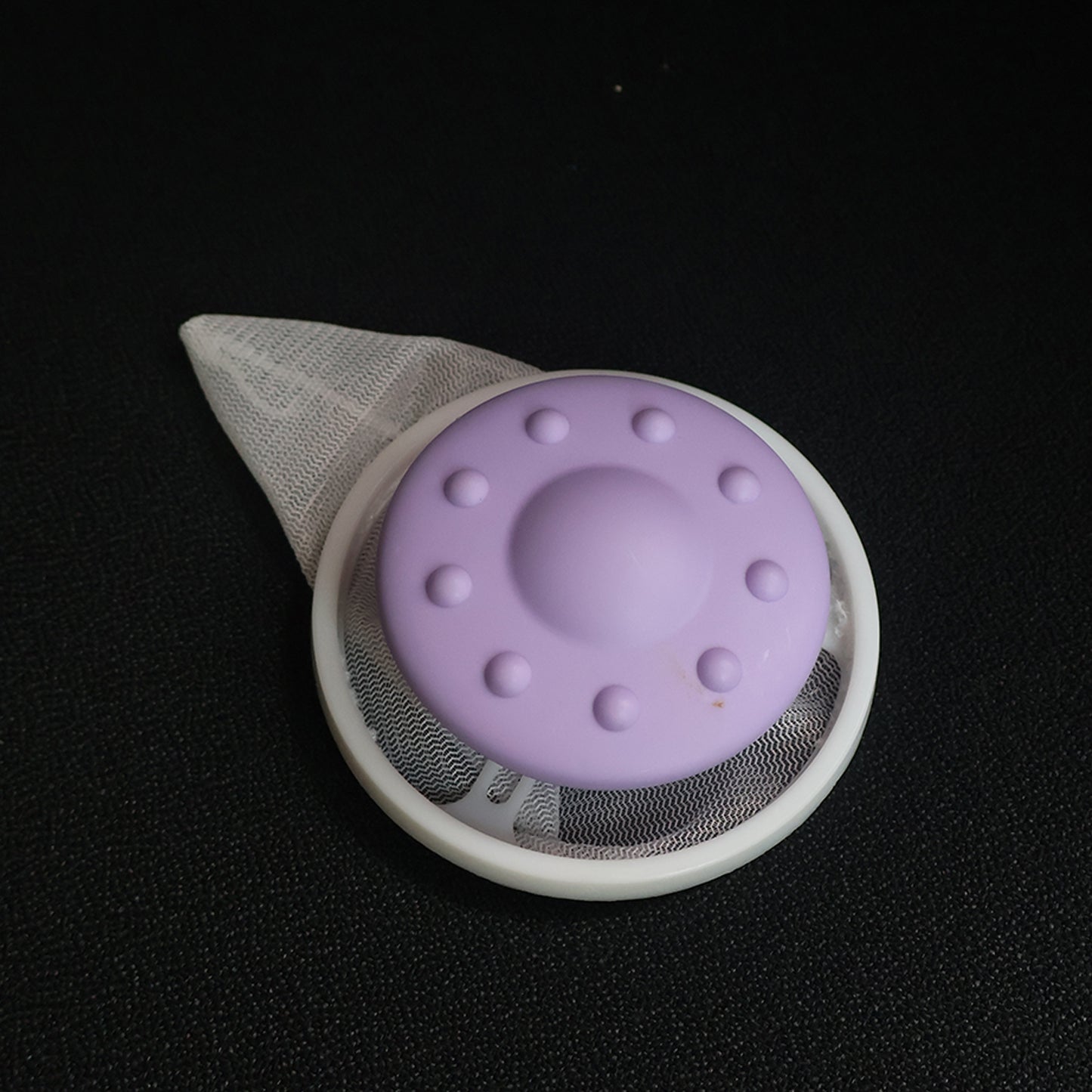 Wukusy floating lint mesh filter bag for washing machines, designed to catch lint and debris during laundry.