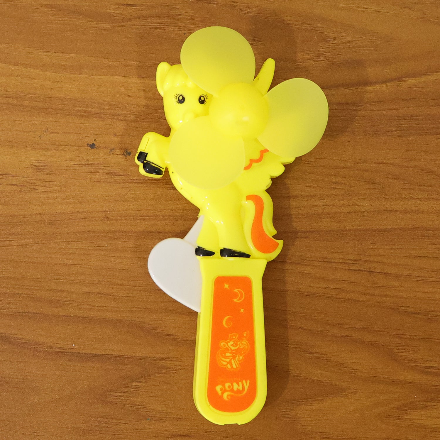 Wukusy mini portable cartoon fan toy in mixed colors, handheld design with fun cartoon character for kids and fans.