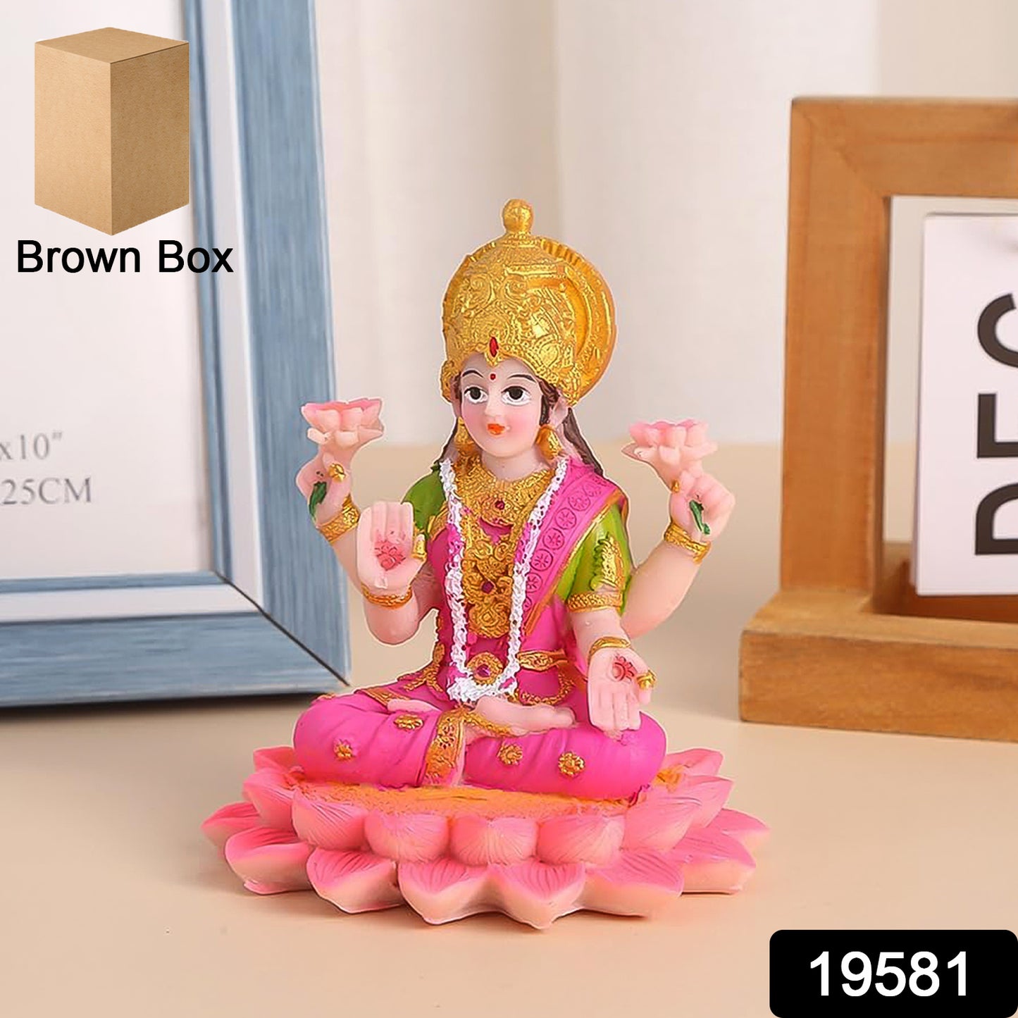 Decorative Lakshmi Mata idol sitting on lotus, Wukusy brand, detailed craftsmanship, ideal for home decor or religious purposes.