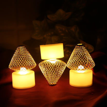 Set of 12 decorative LED flameless candle lights with golden net covers for home decor, arranged in a cozy display.